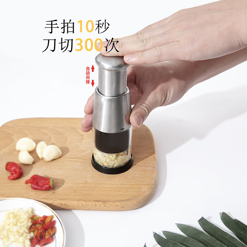 Hot-selling stainless steel garlic pounder for household kitchen use, garlic crusher, garlic cutter, garlic peeler